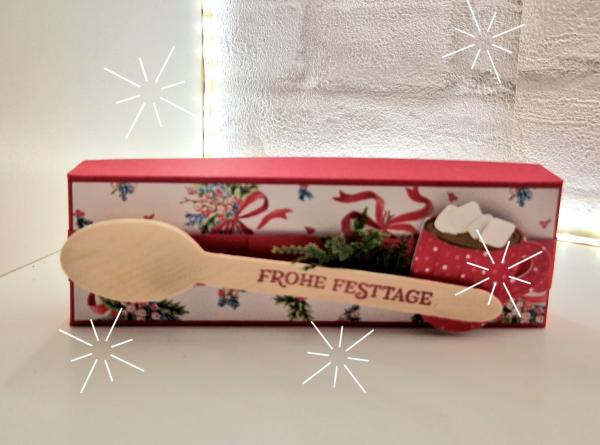 Ein Wohlfühlset "Heiße Schokolade mit Schokopulver, einer Schokolade und Chamallows Minis" Mitbringsel