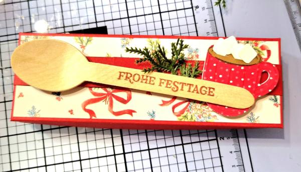 Ein Wohlfühlset "Heiße Schokolade mit Schokopulver, einer Schokolade und Chamallows Minis" Mitbringsel