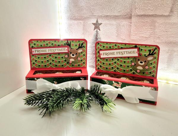 Weihnachtliche Verpackung mit 3 goldene Kugeln