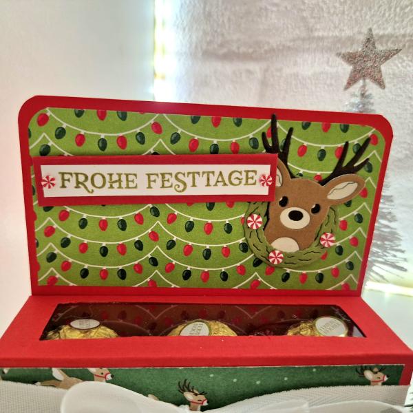 Weihnachtliche Verpackung mit 3 goldene Kugeln